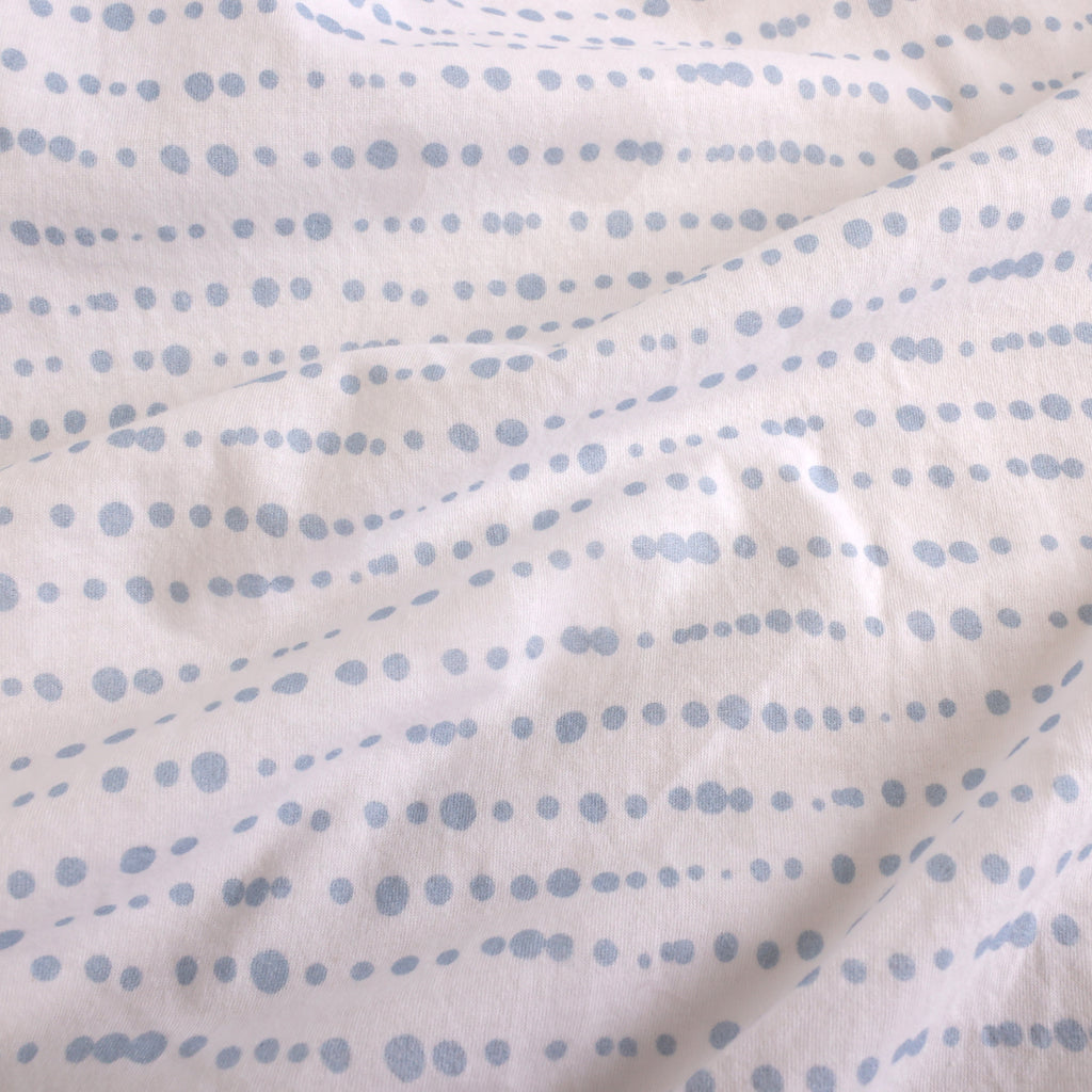 Jersey Fitted Crib Sheet, Blue Dot close up